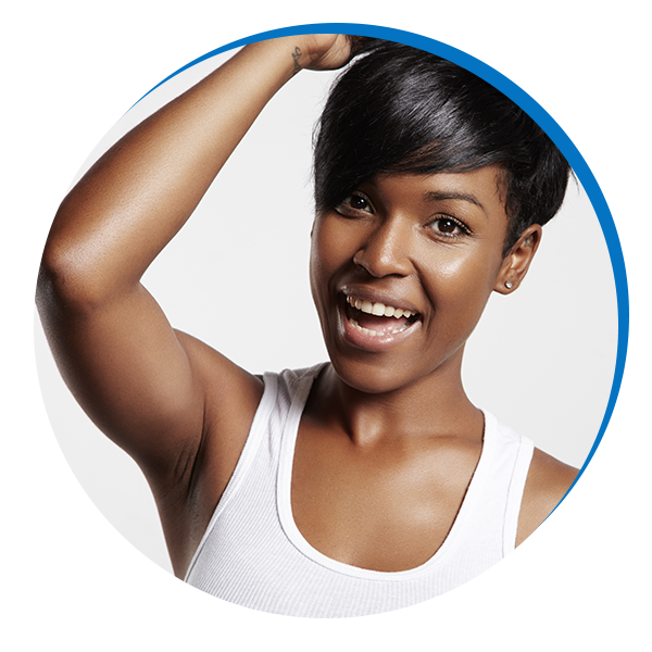 woman with clear skin with her hand in her hair